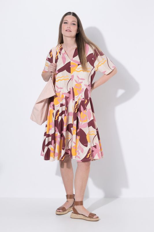 Robe en jersey de coton bio, col tunisien et plis godets