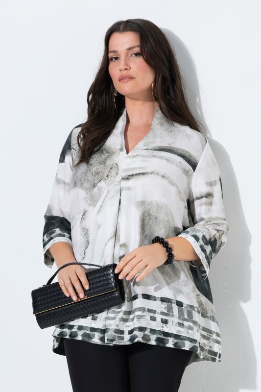 Blouse en satin, bordures contrastantes, col calice et manches 3/4, coupe évasée