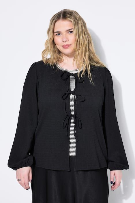 Blouse manches bouffantes, fermeture avec rubans