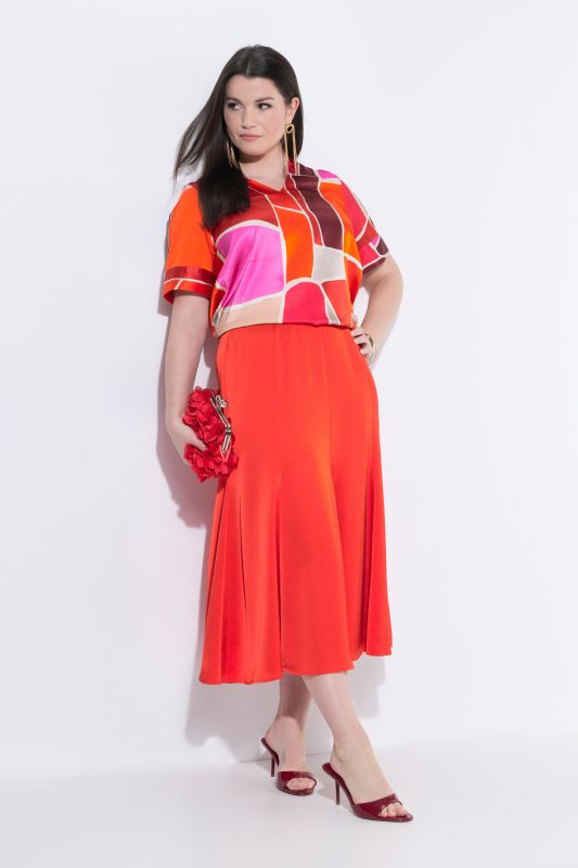 Jupe maxi en satin, coupe cloche et taille élastique