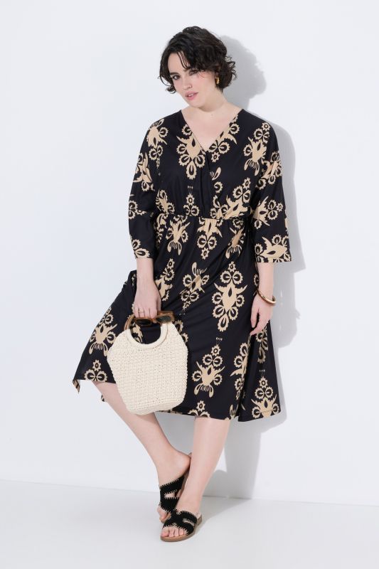 Robe imprimée, décolleté en V effet cache-cœur et manches 3/4