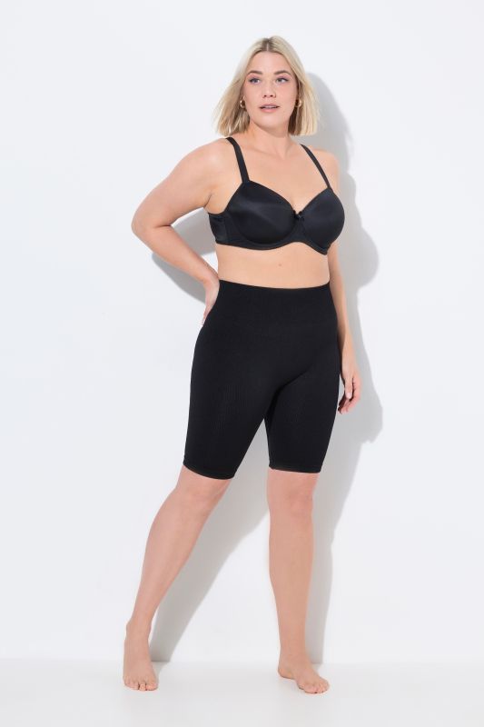 Panty en jersey côtelé. Large bande à la taille. Sans couture extérieure