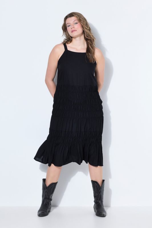 Robe midi évasée sans manches, poitrine smockée