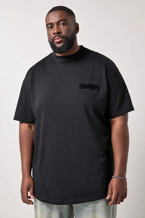 T-shirt oversized. Col rond, manches courtes et imprimé floqué. Jusqu'au 8XL