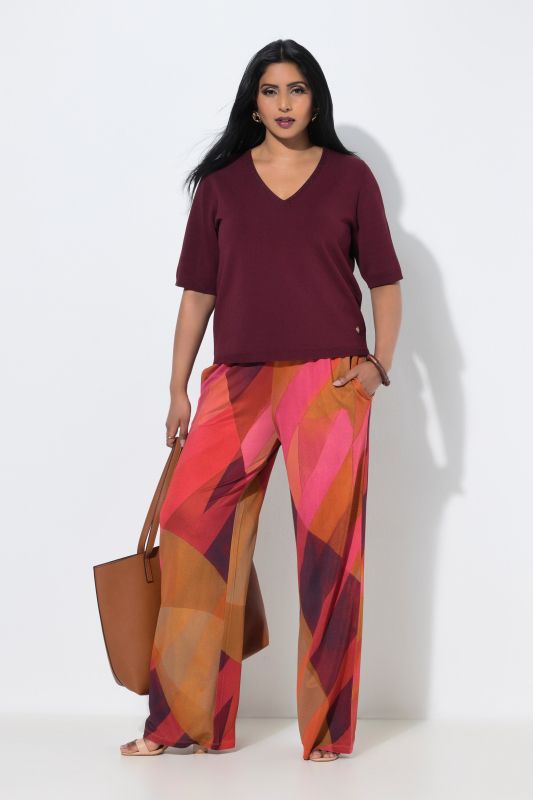 Pantalon au tombé fluide, motif à rayures, jambe large et taille élastique