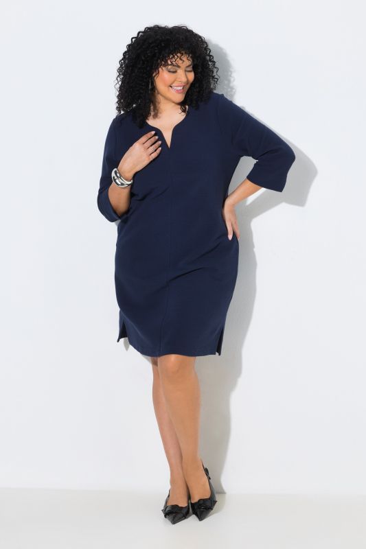 Robe texturée, col tunisien et manches 3/4