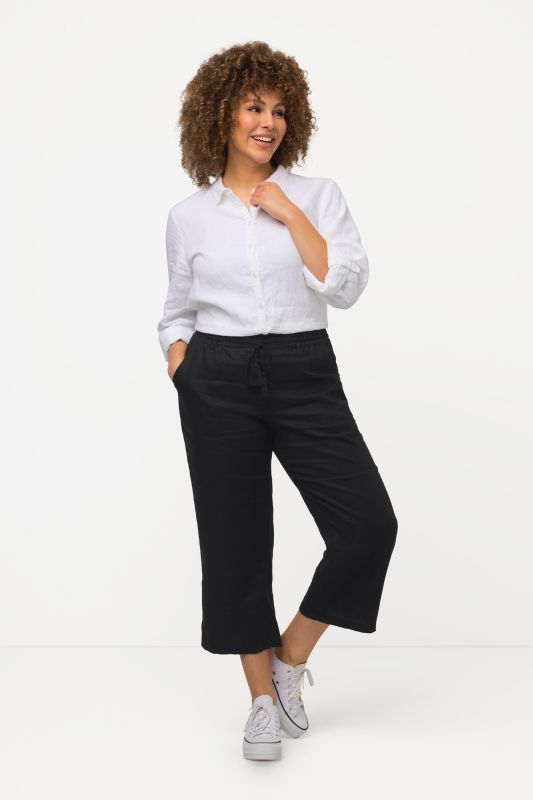 Pantalon en lin 7/8 à taille élastique. Naturellement respirant