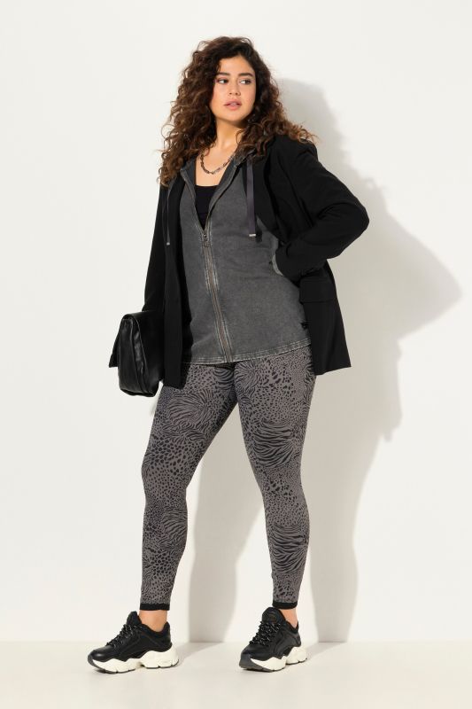 Legging motif léopard. Jambe étroite et bordure en mesh.