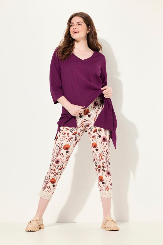 Legging 7/8 en coton bio, taille élastique. Imprimé à fleurs et dentelle.