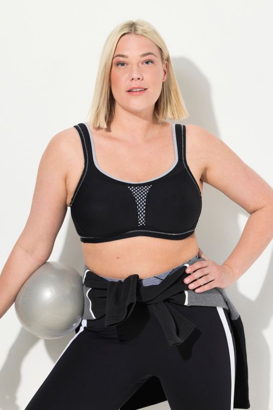 Soutien-gorge de sport, sans armatures. Empiècement en mesh. Bonnet C-E.