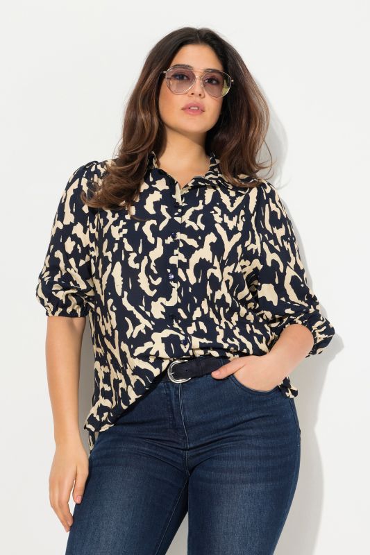 Blouse oversize, col chemise et manches 3/4, plus longue dans le dos