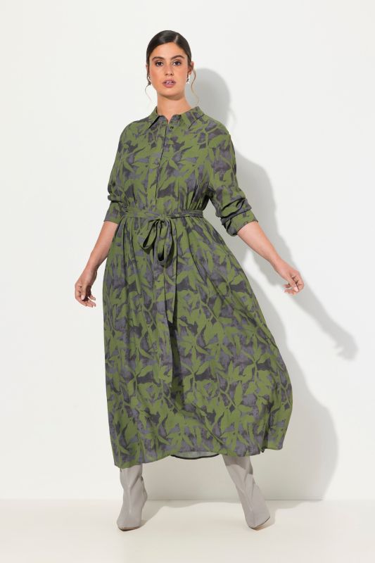 Robe maxi coupe évasée. Col chemise, manches longues et imprimé feuilles.