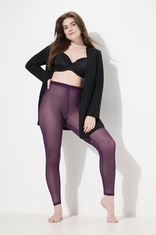 Legging-collant en mesh. Message floqué sur la cuisse