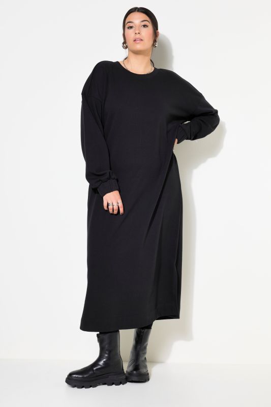 Robe midi en molleton. Manches longues ballon. Coupe oversize