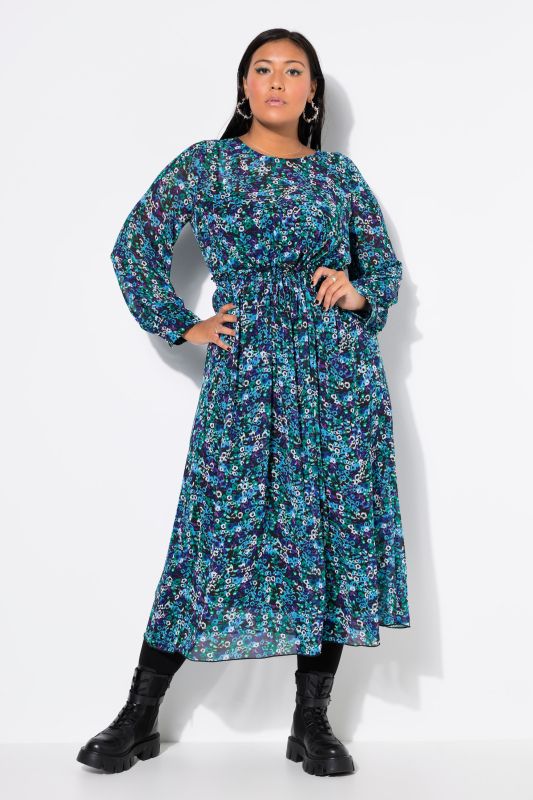 Robe maxi à imprimé floral coloré. Coupe évasée et manches longues