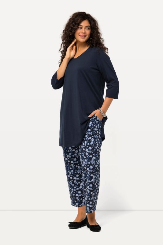 Pantalon 7/8 en jersey, jambe large. Imprimé à fleurs. Taille élastique.