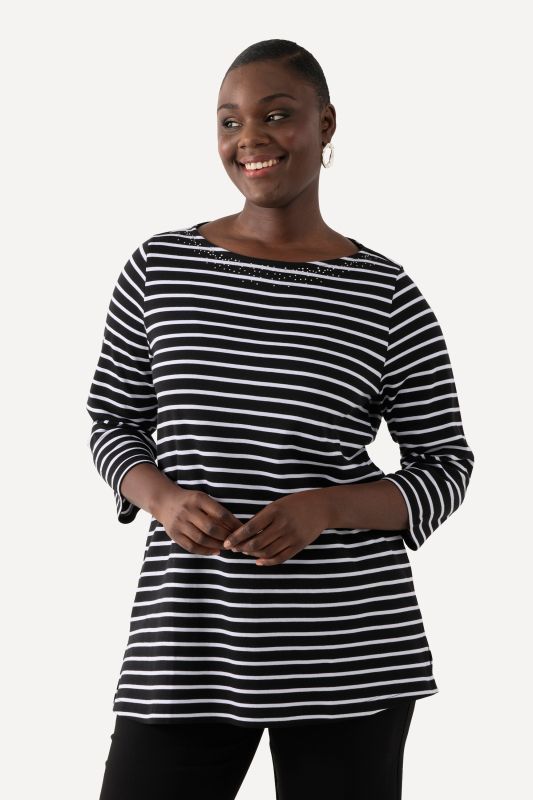 T-shirt rayé en coton Pima. Décolleté bateau et manches 3/4.