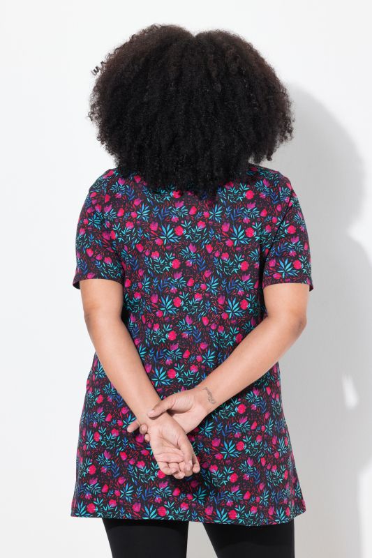 T-shirt long avec poches, coupe évasée, manches courtes et col tunisien