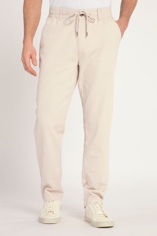 Pantalon aspect lin. Taille élastique. Coupe décontractée.
