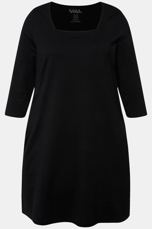 T-shirt long, col carré et manches 3/4. Silhouette en A.