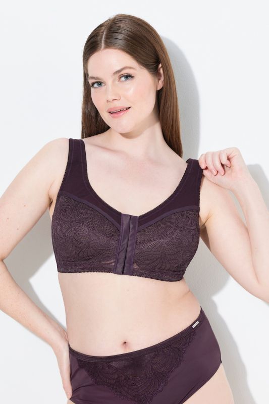 Soutien-gorge de maintien, sans armatures. Fermeture sur l’avant. Bonnet C-F.