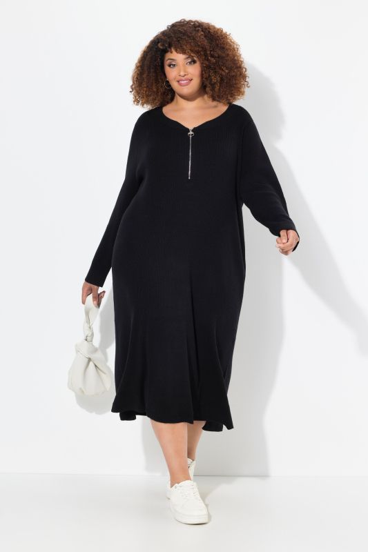 Robe midi en jersey bord-côte. Décolleté en V, fermeture à glissière et manches longues. Coupe évasée.