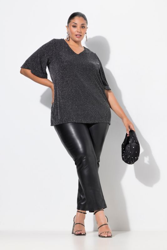 Pantalon en simili-cuir, matière stretch et taille élastique. Coupe Slim Fit.