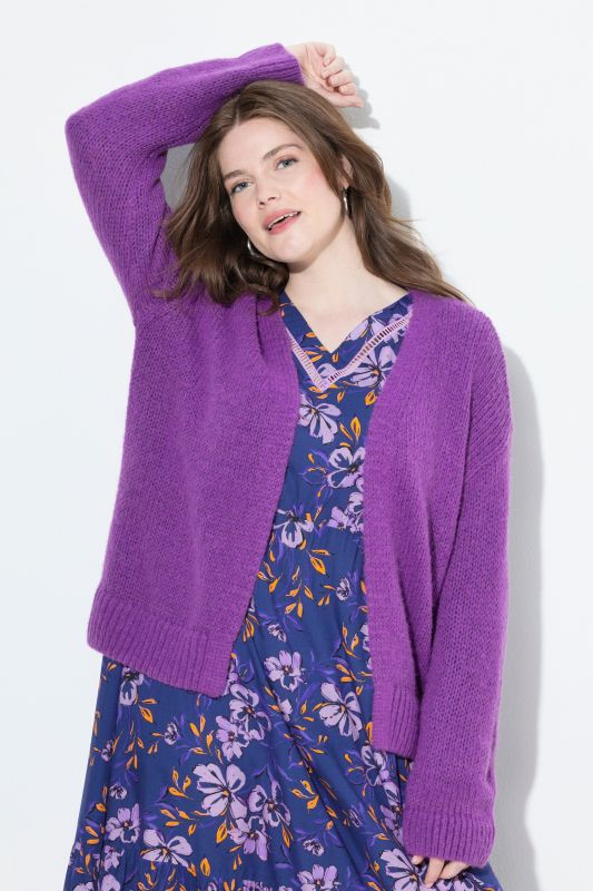 Cardigan ouvert, coupe courte et oversize, contient de la laine