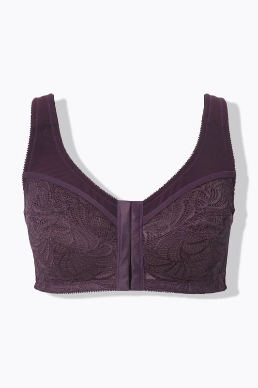 Soutien-gorge de maintien, sans armatures. Fermeture sur l’avant. Bonnet C-F.
