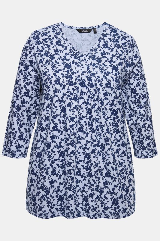 T-shirt avec plis fantaisie. Col en V et manches 3/4, coupe évasée.
