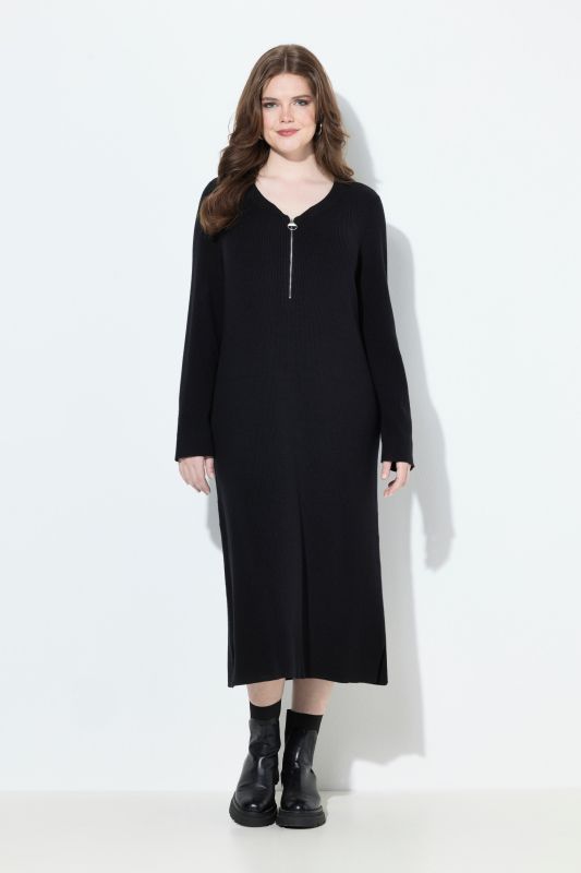 Robe midi en jersey bord-côte. Décolleté en V, fermeture à glissière et manches longues. Coupe évasée.