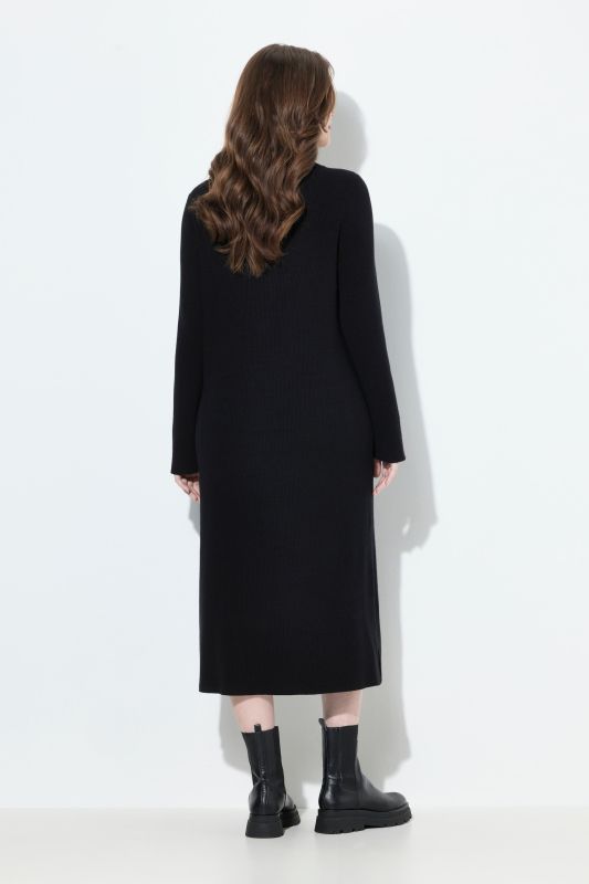 Robe midi en jersey bord-côte. Décolleté en V, fermeture à glissière et manches longues. Coupe évasée.