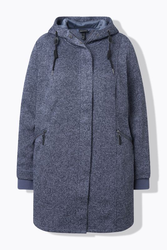 Veste en maille polaire à capuche. Poches zippées et fermeture à glissière à double sens.