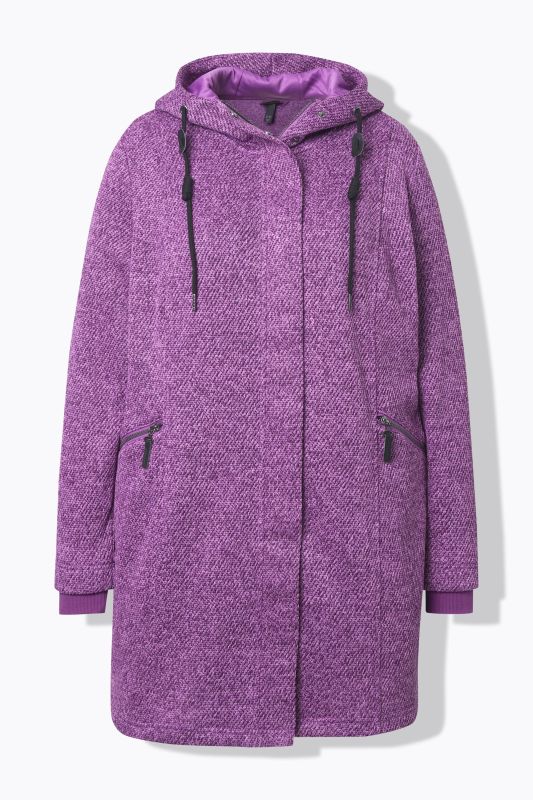 Veste en maille polaire à capuche. Poches zippées et fermeture à glissière à double sens.
