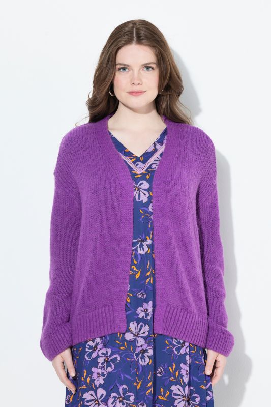 Cardigan ouvert, coupe courte et oversize, contient de la laine