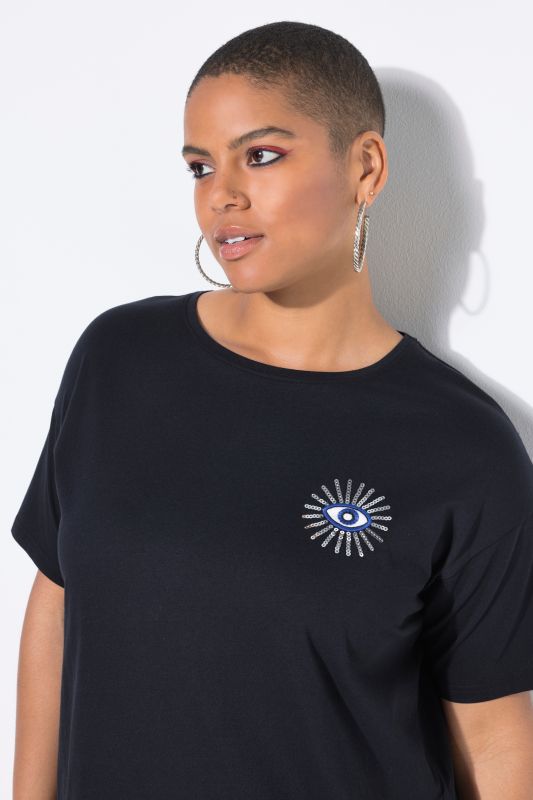 T-shirt oversize. Manches courtes. Motif œil scintillant