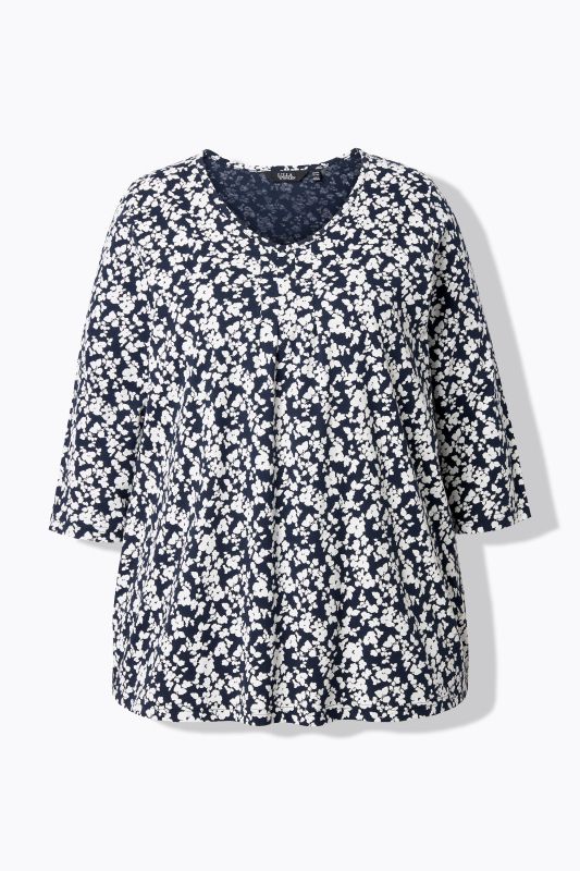 T-shirt avec plis fantaisie. Col en V et manches 3/4, coupe évasée.