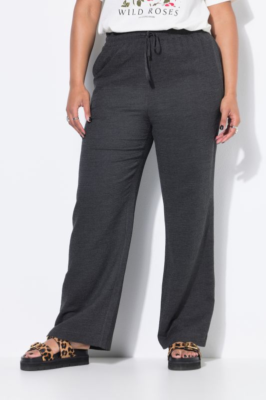 Pantalon finement texturé. Coupe Wide Legs, taille haute