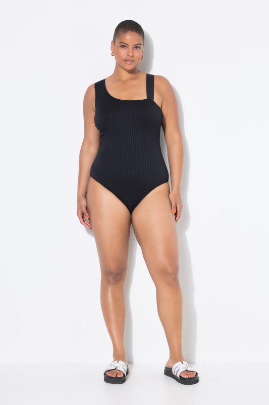 Maillot de bain à bonnets souples. Effet épaule nue. Matière à rayures texturées