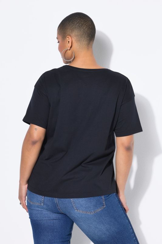 T-shirt oversize. Manches courtes. Motif œil scintillant