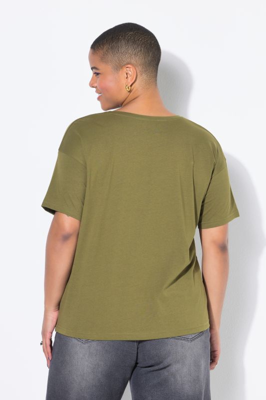 T-shirt oversize. Manches courtes. Motif œil scintillant