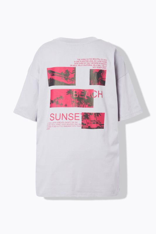 T-shirt oversize, motif palmiers. Manches courtes