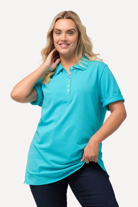 Polo en maille piquée. Patte de boutonnage en velours. Manches courtes