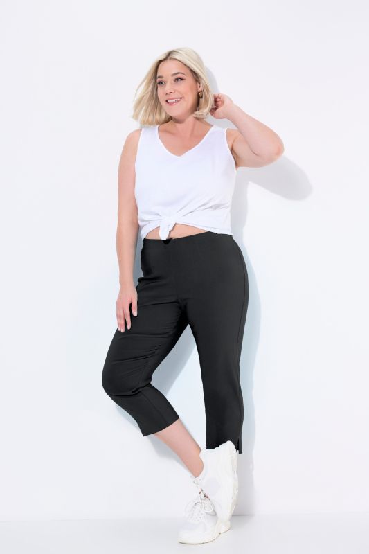 Pantalon en bengaline stretch. Longueur au mollet et taille élastique