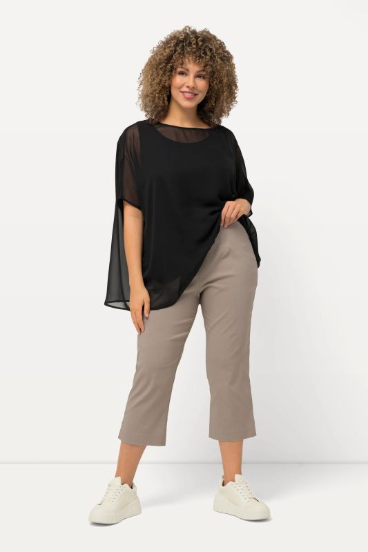 Pantalon en bengaline stretch. Longueur au mollet et taille élastique