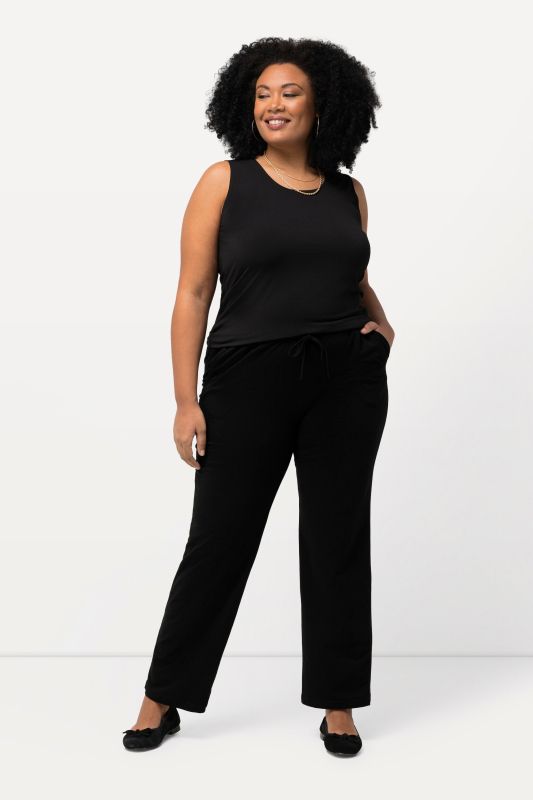Pantalon en jersey avec jambes droites et poches, jusqu'à la taille 68/70