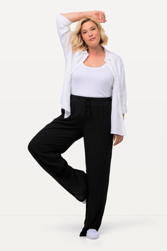 Pantalon Rose en viscose. Jambe large, taille élastique et cordon de serrage