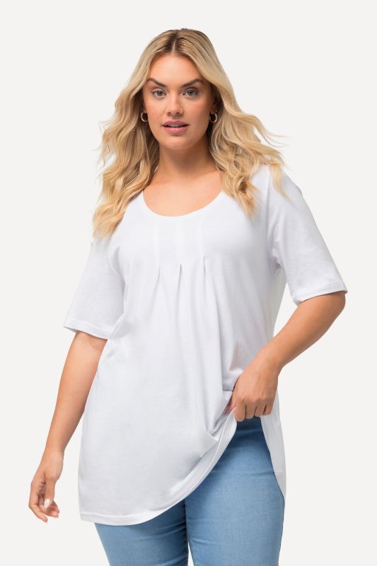 T-shirt en modal. Plis fantaisie, col rond et manches courtes. Coupe évasée