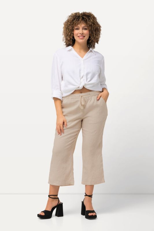 Pantalon 7/8 en lin, naturellement respirant. Taille élastique