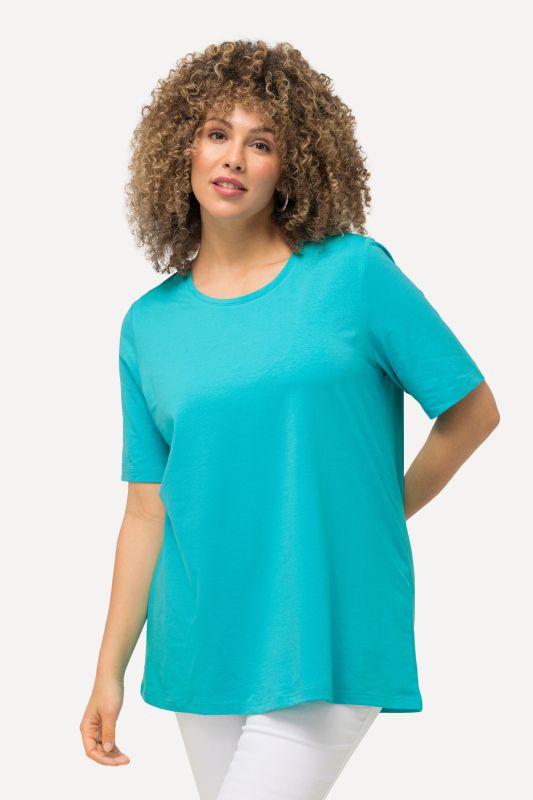 T-shirt en coton bio. Col rond et manches courtes. Coupe évasée